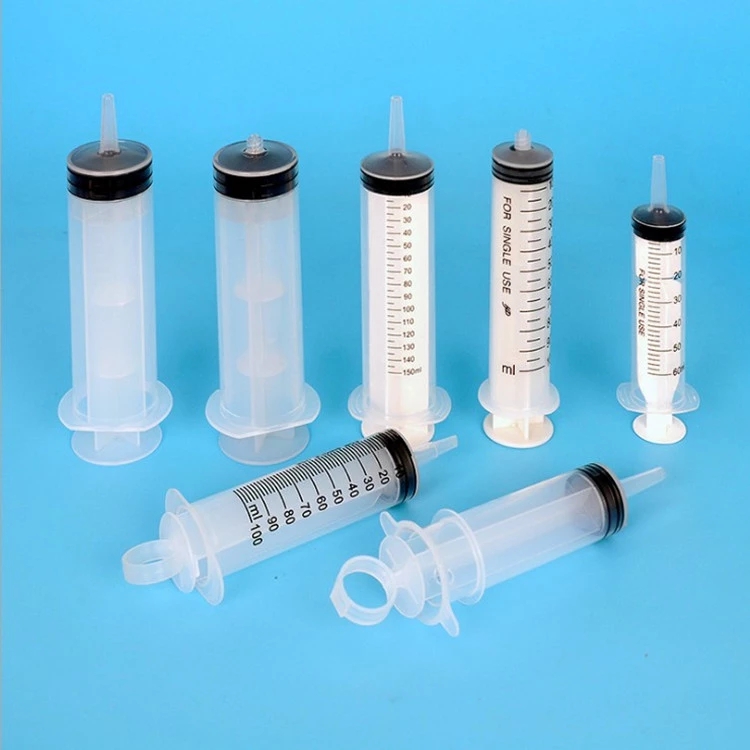 Moist Gauze + Irrigation Syringe